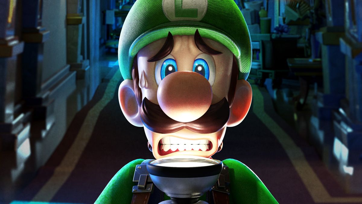 Luigi cowers in fear, shining a torch up into his face in a dark hallway