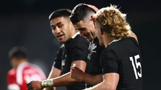 Will Jordan of the All Blacks celebrates with team mates after scoring a try during the International Test match between the New Zealand All Blacks and Tonga at Mt Smart Stadium