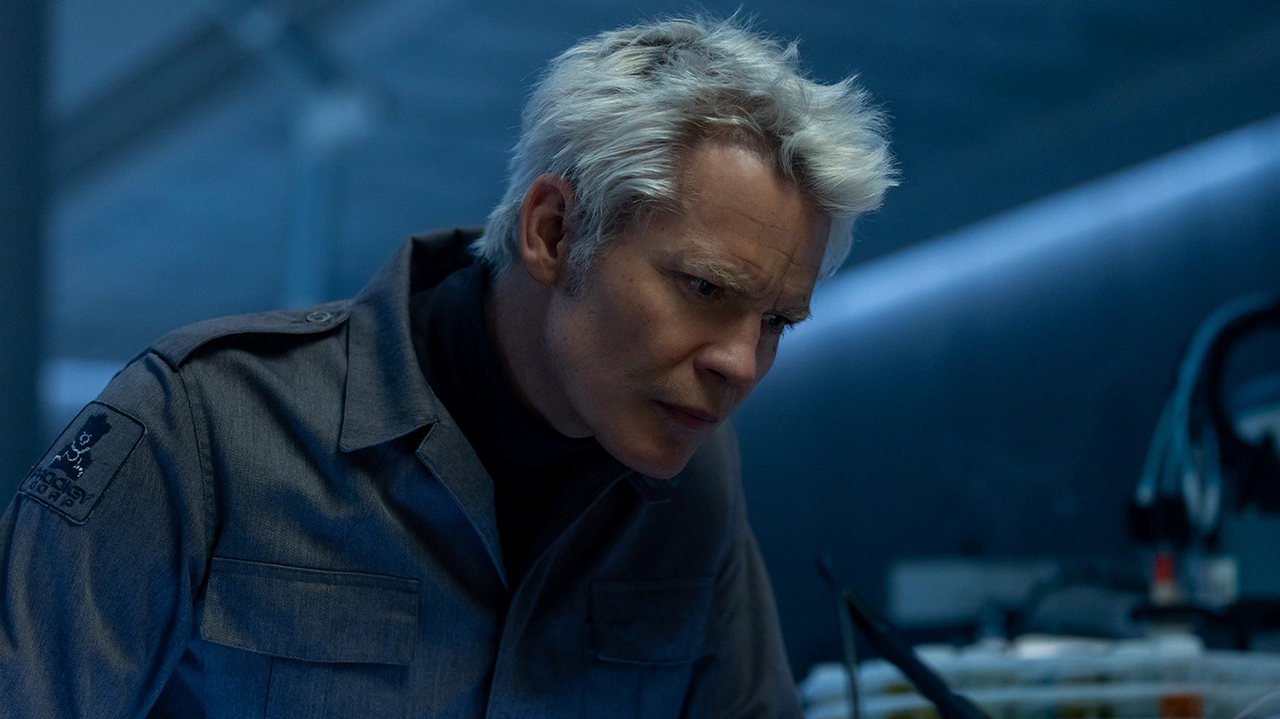 Kirsh leaning over a table in Alien: Earth season 1 episode 8