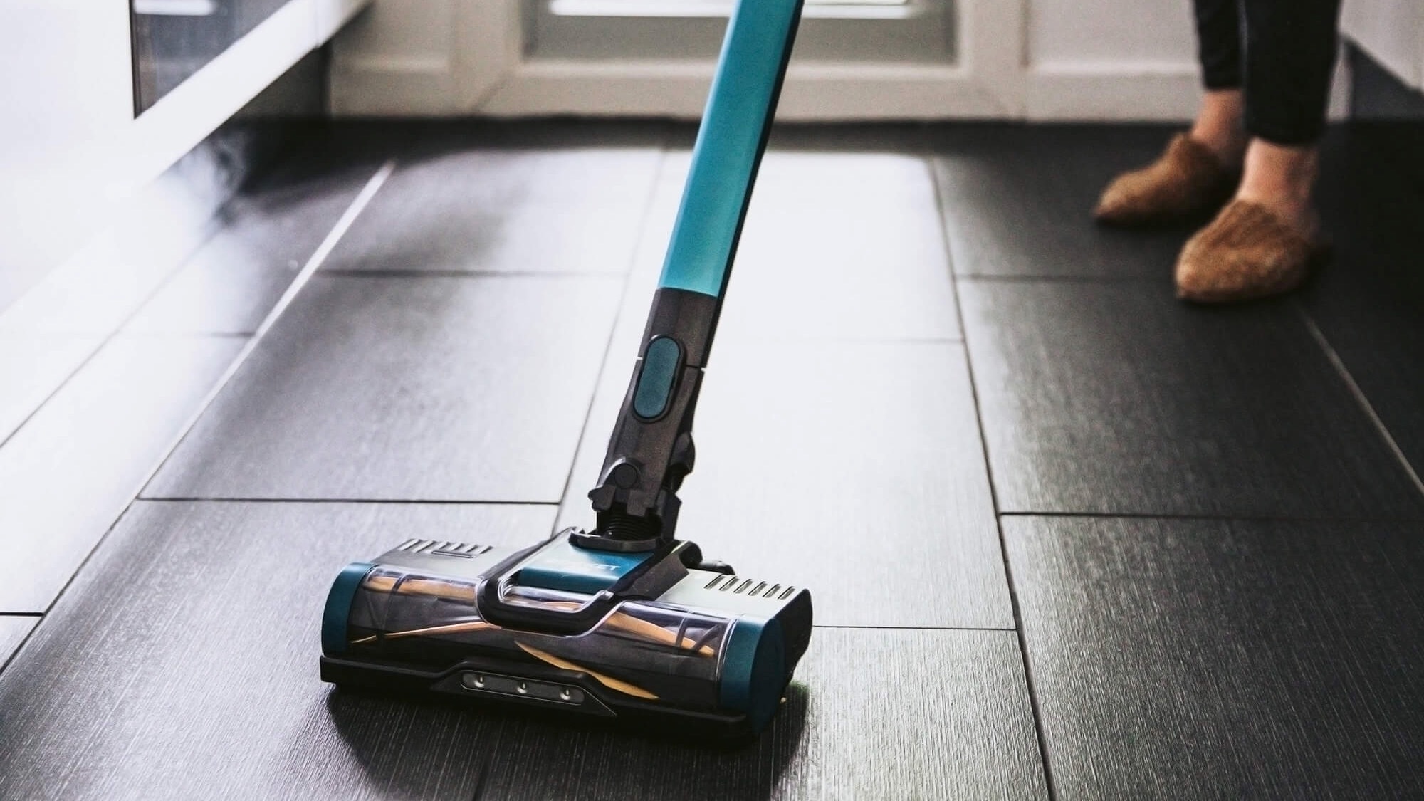 The Shark IZ102 cleaning head on tiled floors