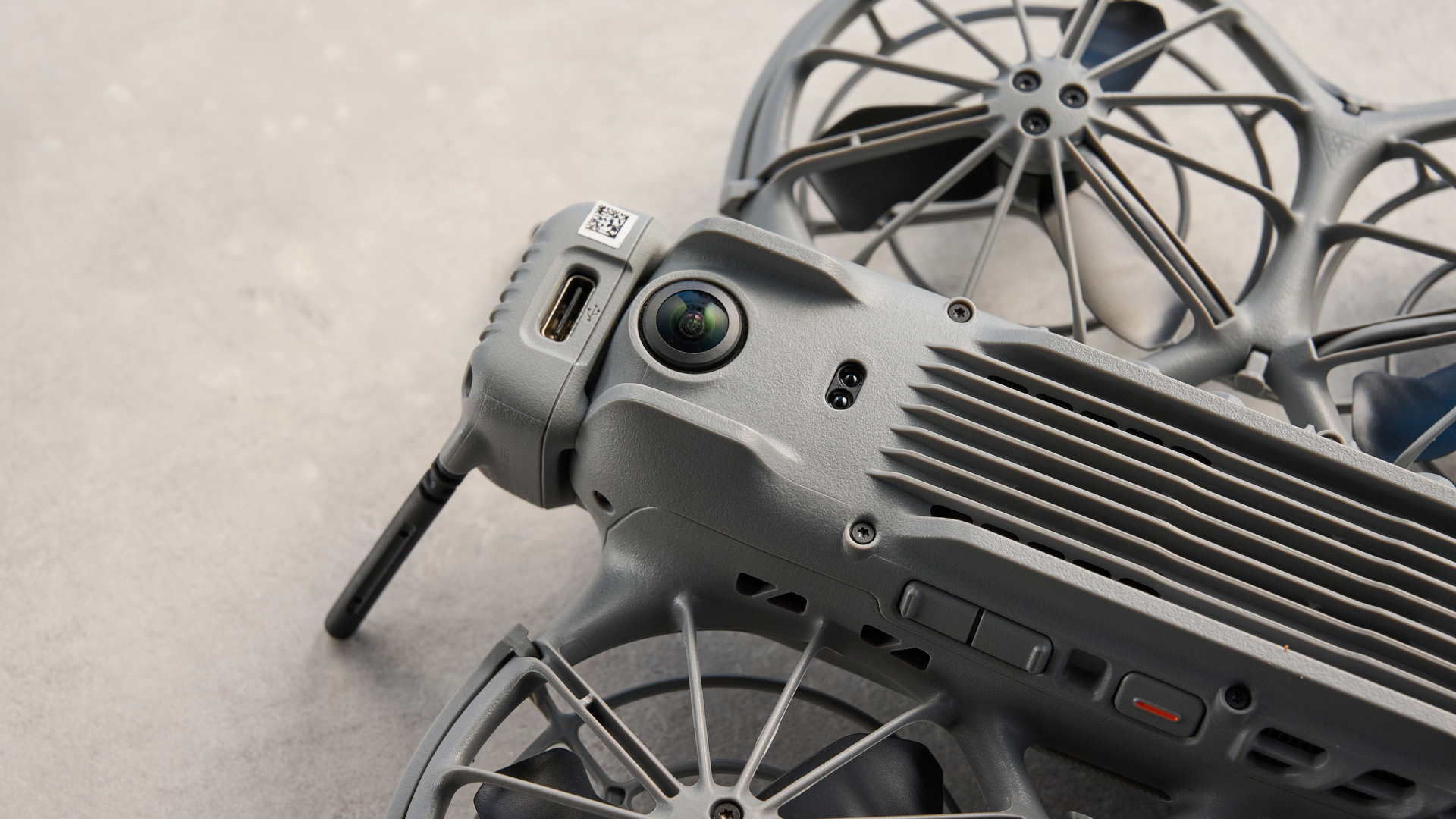 A dark gray DJI Neo 2 camera drone