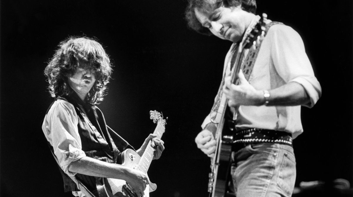 Jimmy‌ Page and Paul Rodgers performing with The ‍Firm