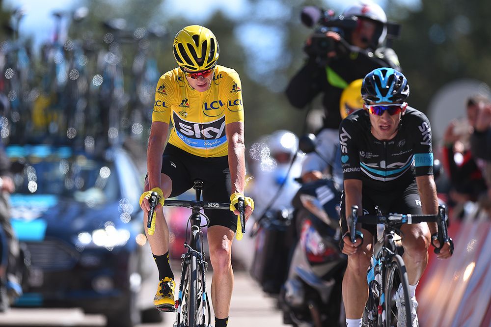 Chris Froome crosses the finish line with teammate Sergio Henao