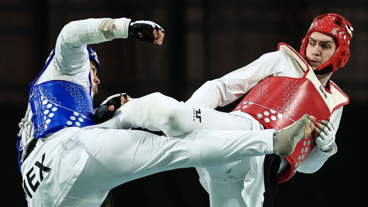 Jonathan Daniel Healy (Red) of Team USA competes against Carlos Adrian Sansores (Blue) of Team Mexico during the Men&#039;s Taekwondo Kyorugi +80 Kg at the Santiago 2023 Pan Am Games ahead of the 2024 Paris Olympics