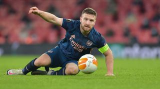 LONDON, ENGLAND - DECEMBER 03: (BILD ZEITUNG OUT) Shkodran Mustafi of Arsenal controls the ball during the UEFA Europa League Group B stage match between Arsenal FC and Rapid Wien at Emirates Stadium on December 3, 2020 in London, United Kingdom. Sporting stadiums around the UK remain under strict restrictions due to the Coronavirus Pandemic as Government social distancing laws prohibit fans inside venues resulting in games being played behind closed doors. (Photo by Vincent Mignott/DeFodi Images via Getty Images)