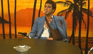 Scarface Al Pacino aims a pistol off screen