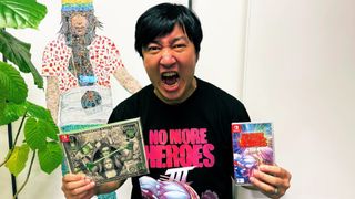 Suda51 poses with No More Heroes merch