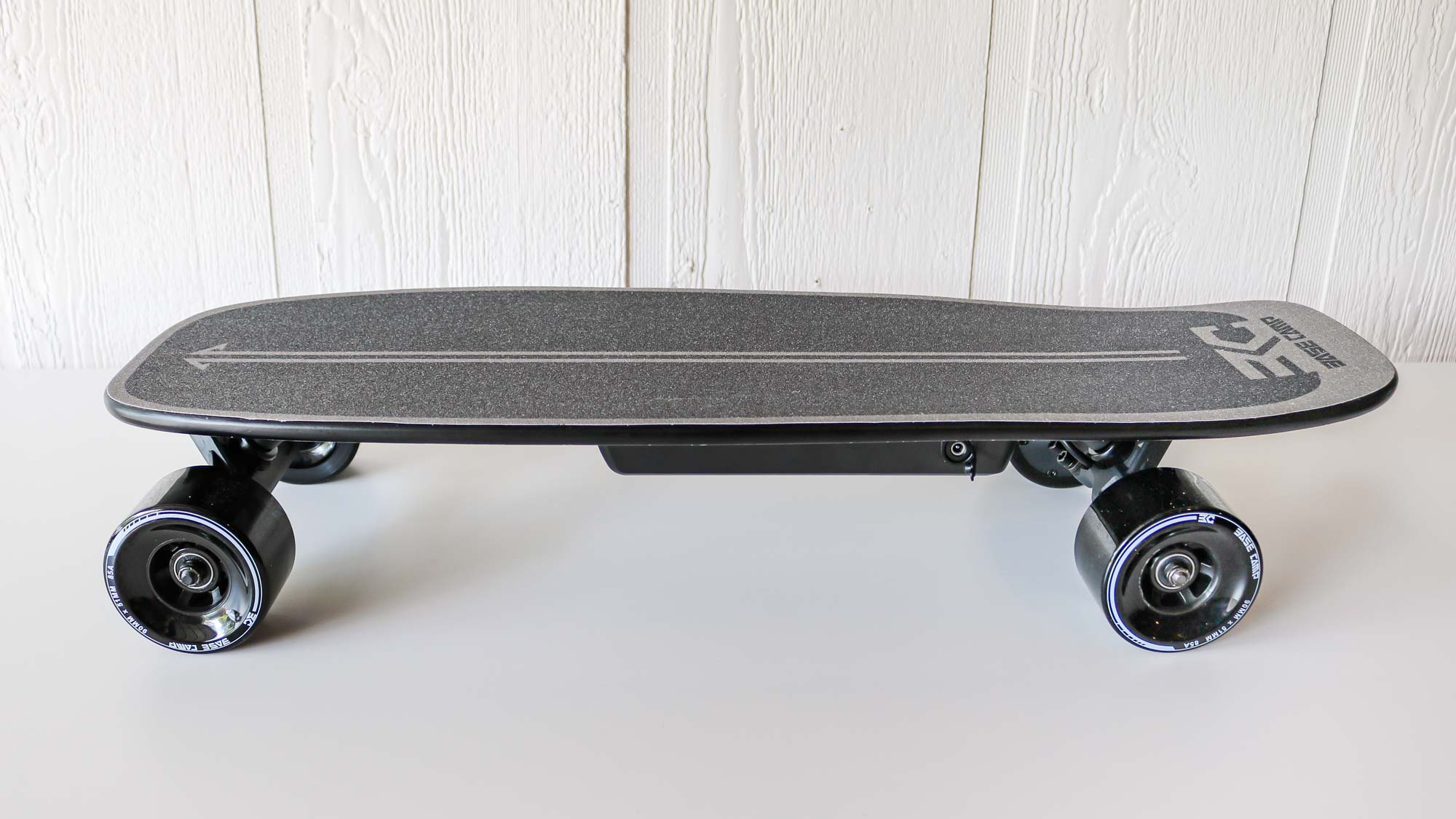 Side view of the Base Camp F11 electric skateboard