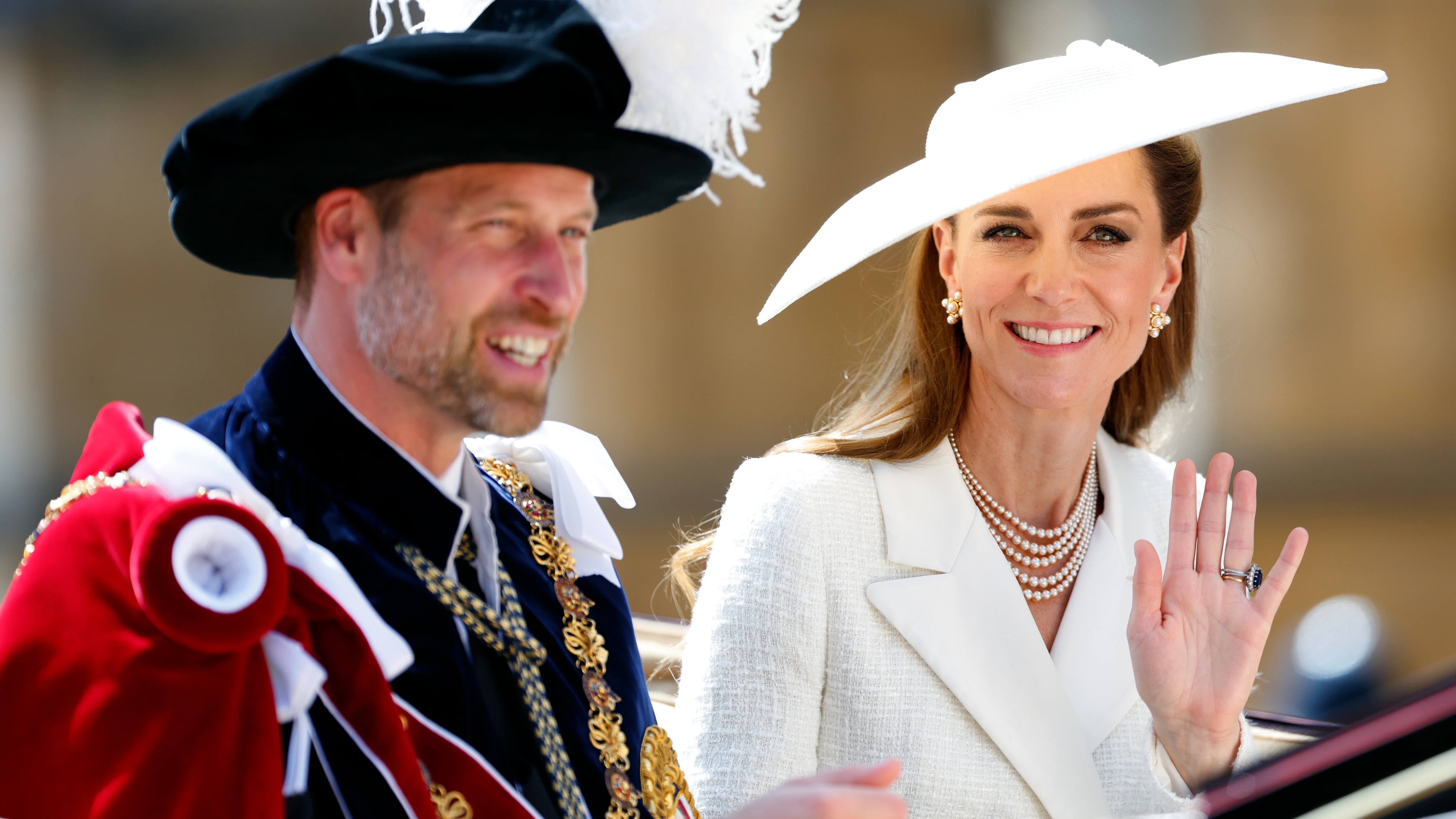 Prince William (wearing the Mantle and Tudor bonnet of the Order of the Garter) and Catherine, Princess of Wales, ride in a horse-drawn carriage as they attend the Order of the Garter service at St. George's Chapel, Windsor Castle on June 16, 2025