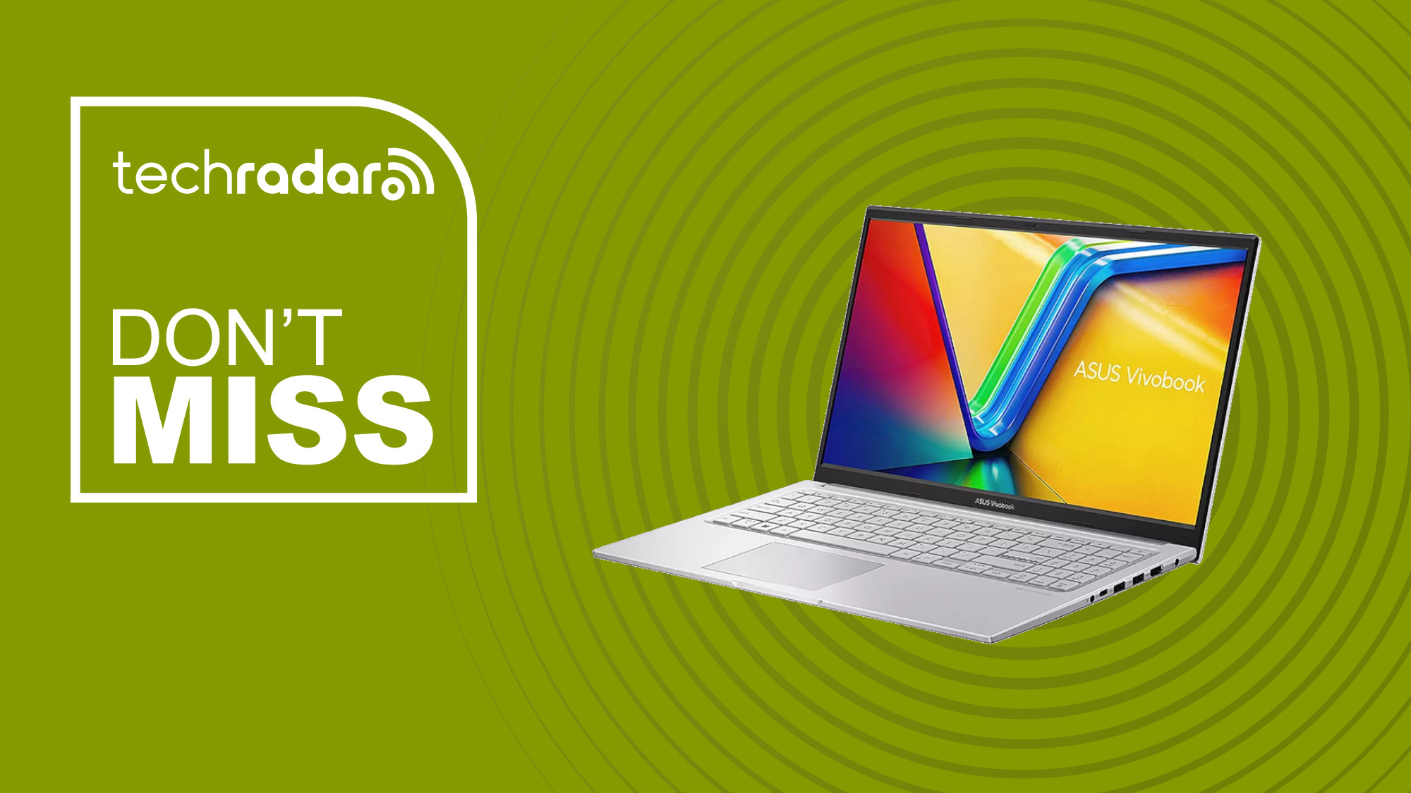 Asus Vivobook 15 on a green background