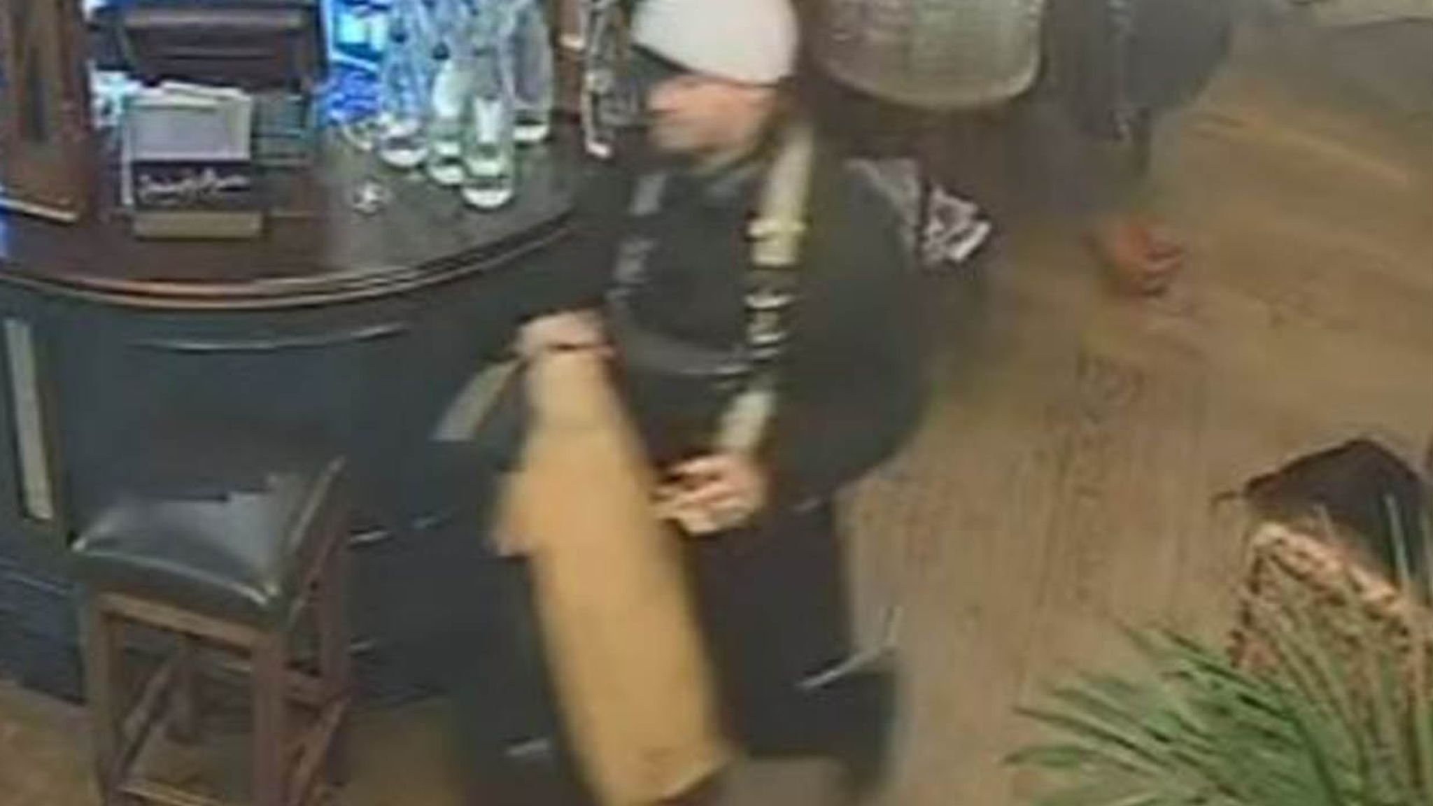 A man stealing a violin, on CCTV