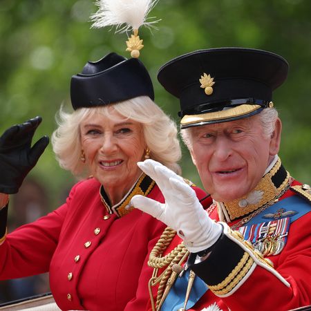 Queen Camilla wears a fiery hat and a military uniform while arriving at Trooping the Colour 2026