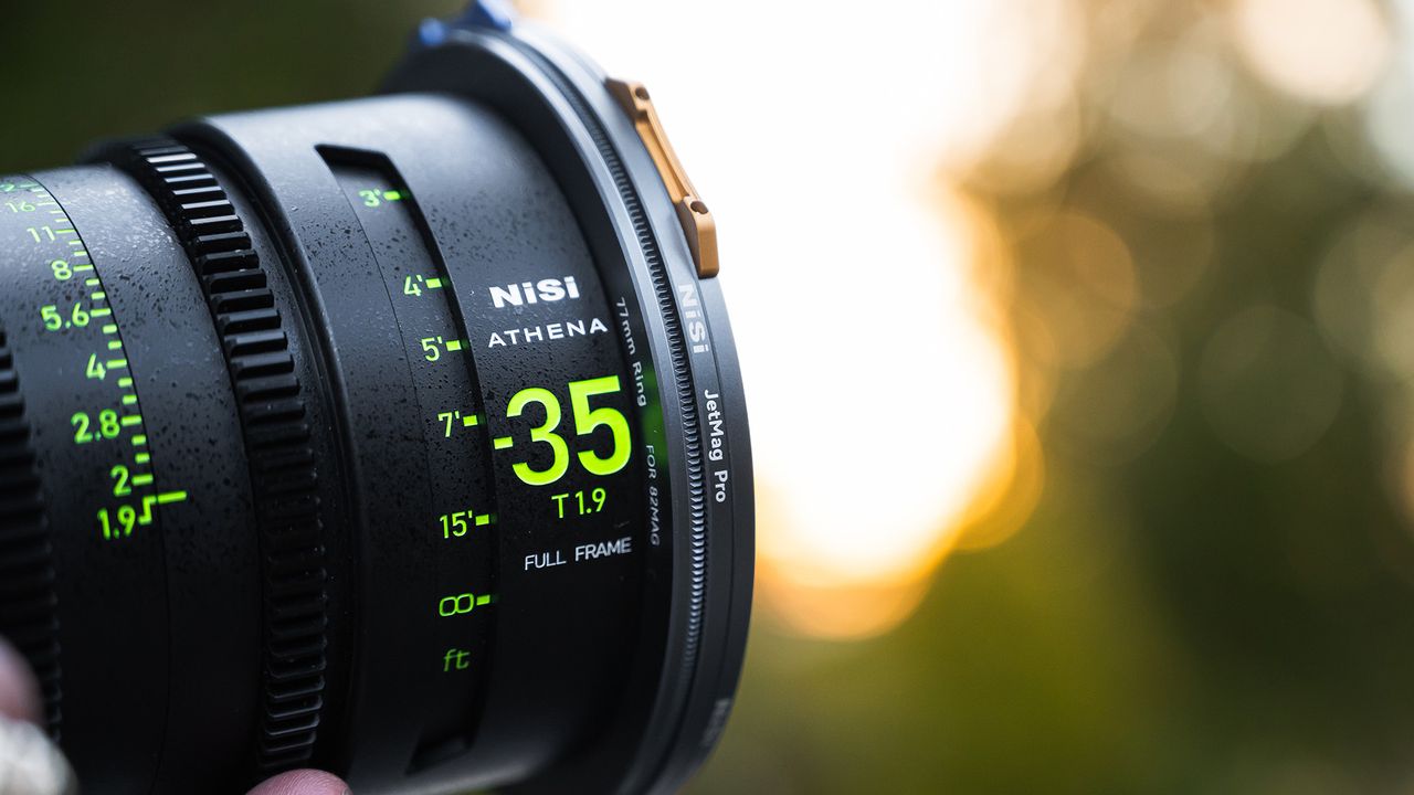 NiSi JetMag Pro Filter System filter attached to lens against golden hour, bokeh background