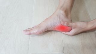 A foot with a red heel