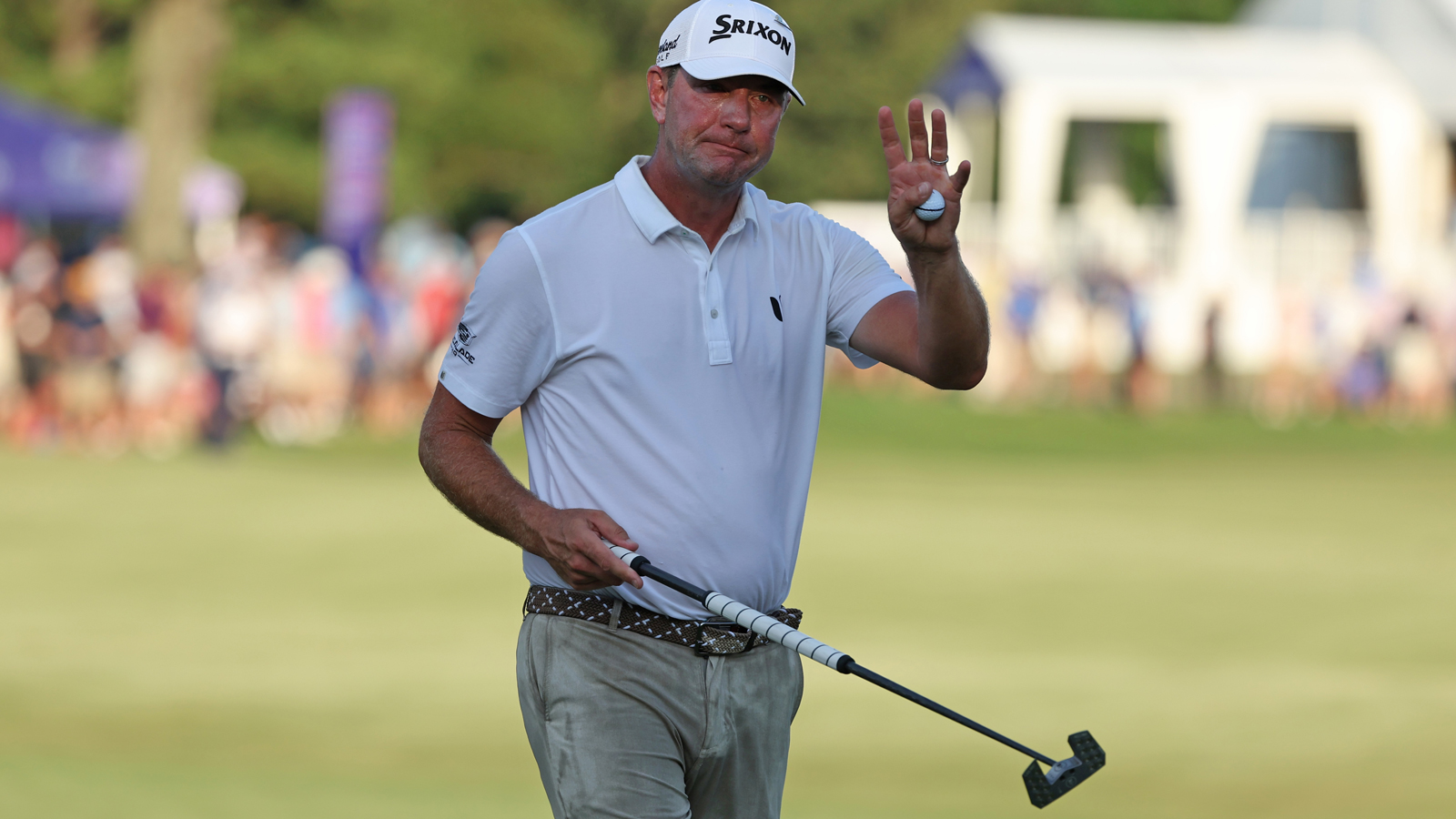 Lucas Glover waves to the crowd after securing victory