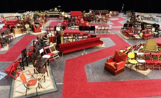 Fashion runway with multiple old pieces of furniture