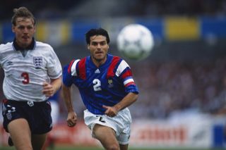 France defender Manuel Amoros (right) competes for the ball with England's Stuart Pearce at Euro 92.