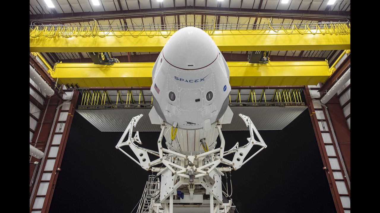 SpaceX's Falcon 9 rocket and Crew Dragon spacecraft are pictured in the hanger at Launch Complex 39 A on May 20, 2020.