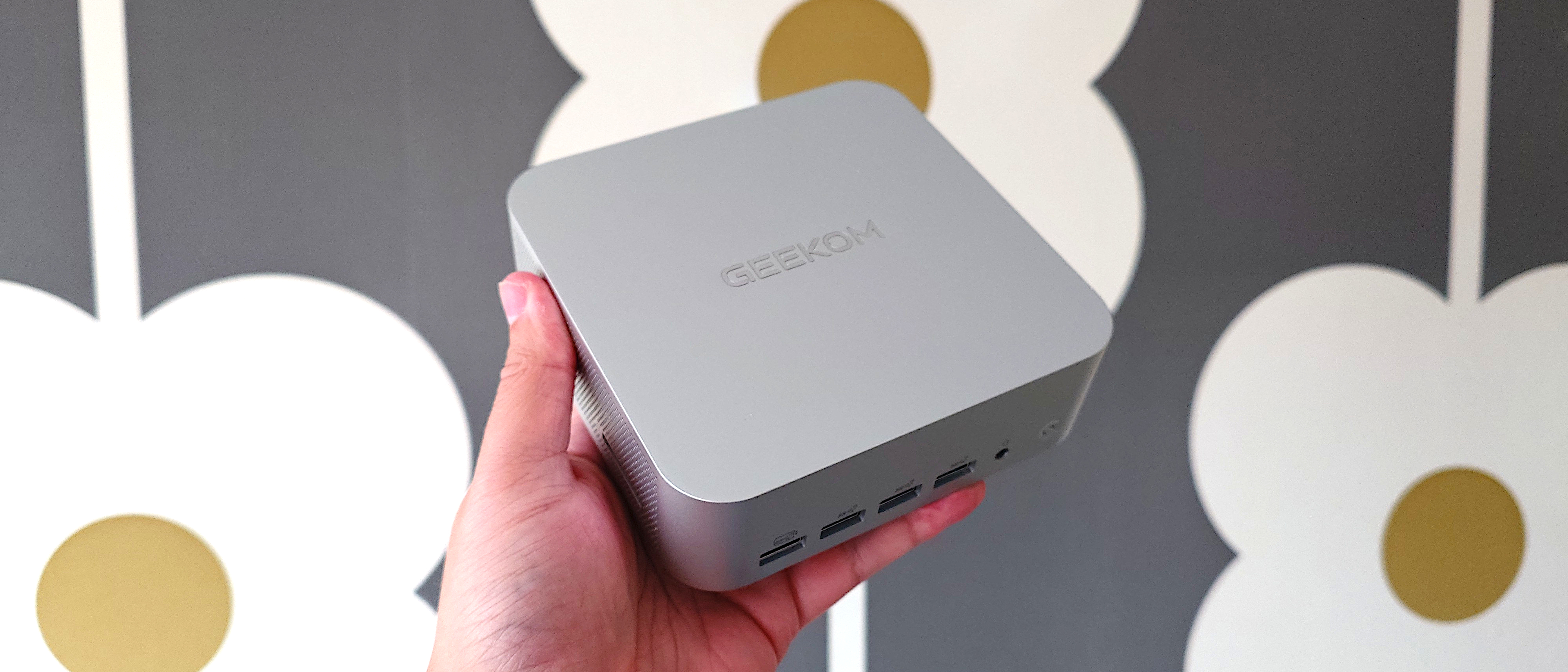 Geekom A9 Max mini PC being held in the hand