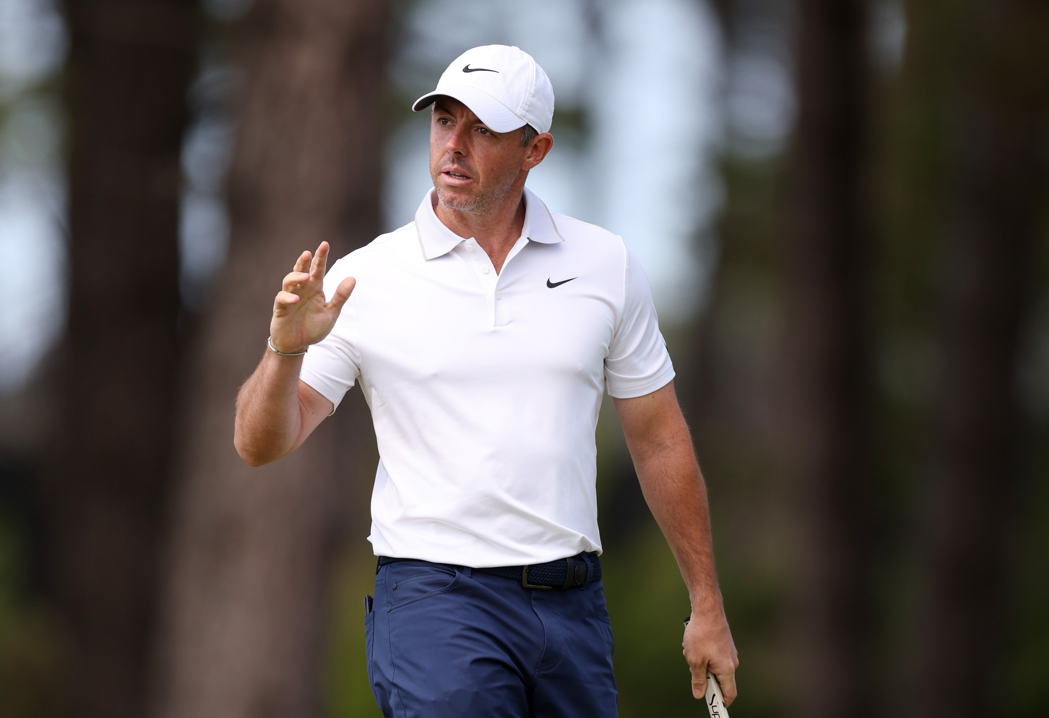 Rory McIlroy waves to the crowd
