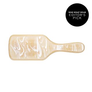 Bamboo paddle brush in leche