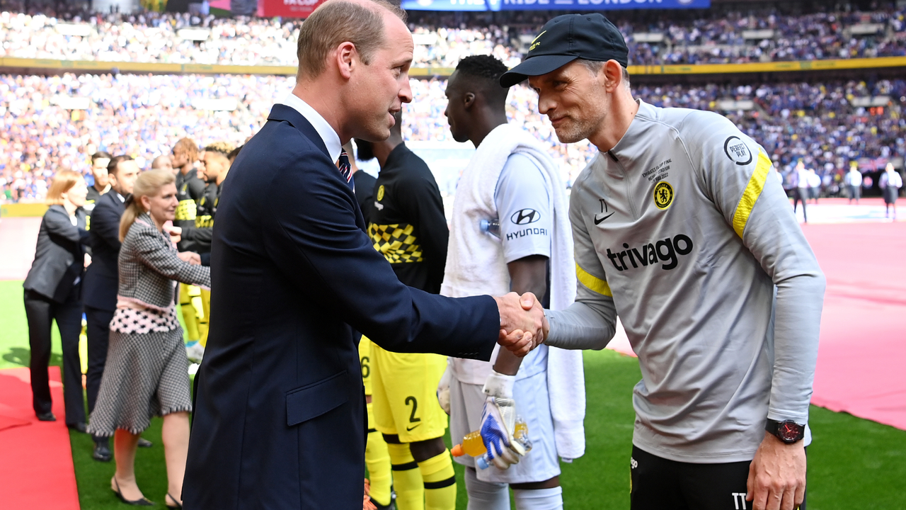 Prince William, The Duke of Cambridge greets Thomas Tuchel, Manager of Chelsea prior to The FA Cup Final match between Chelsea and Liverpool at Wembley Stadium on May 14, 2022 in London, England