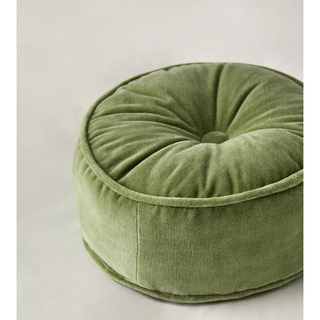 green round pintucked velvet cushion