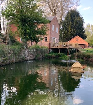 A mill house has been converted into a family home with a relaxing style