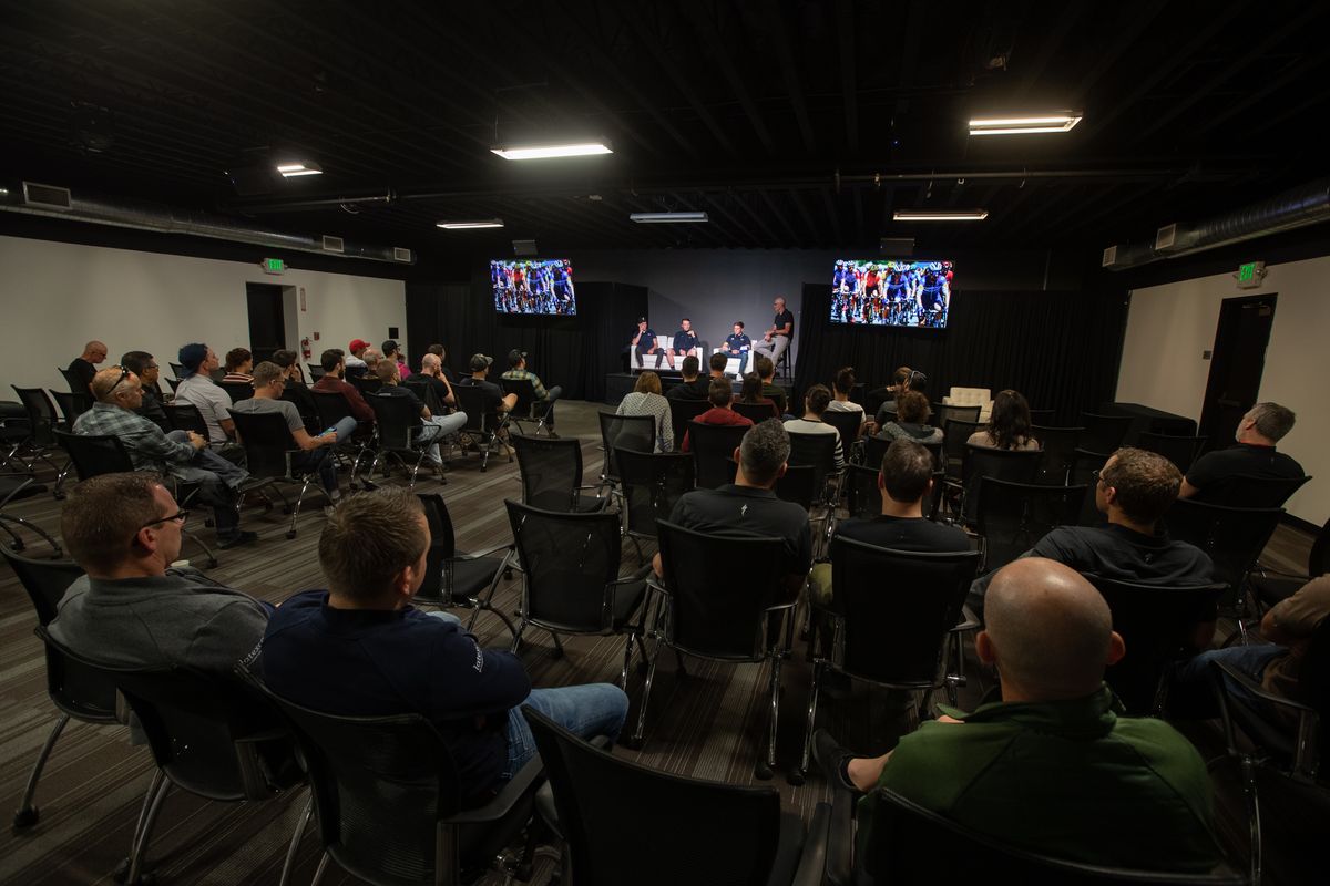The riders on stage for a talk with Specialized staff