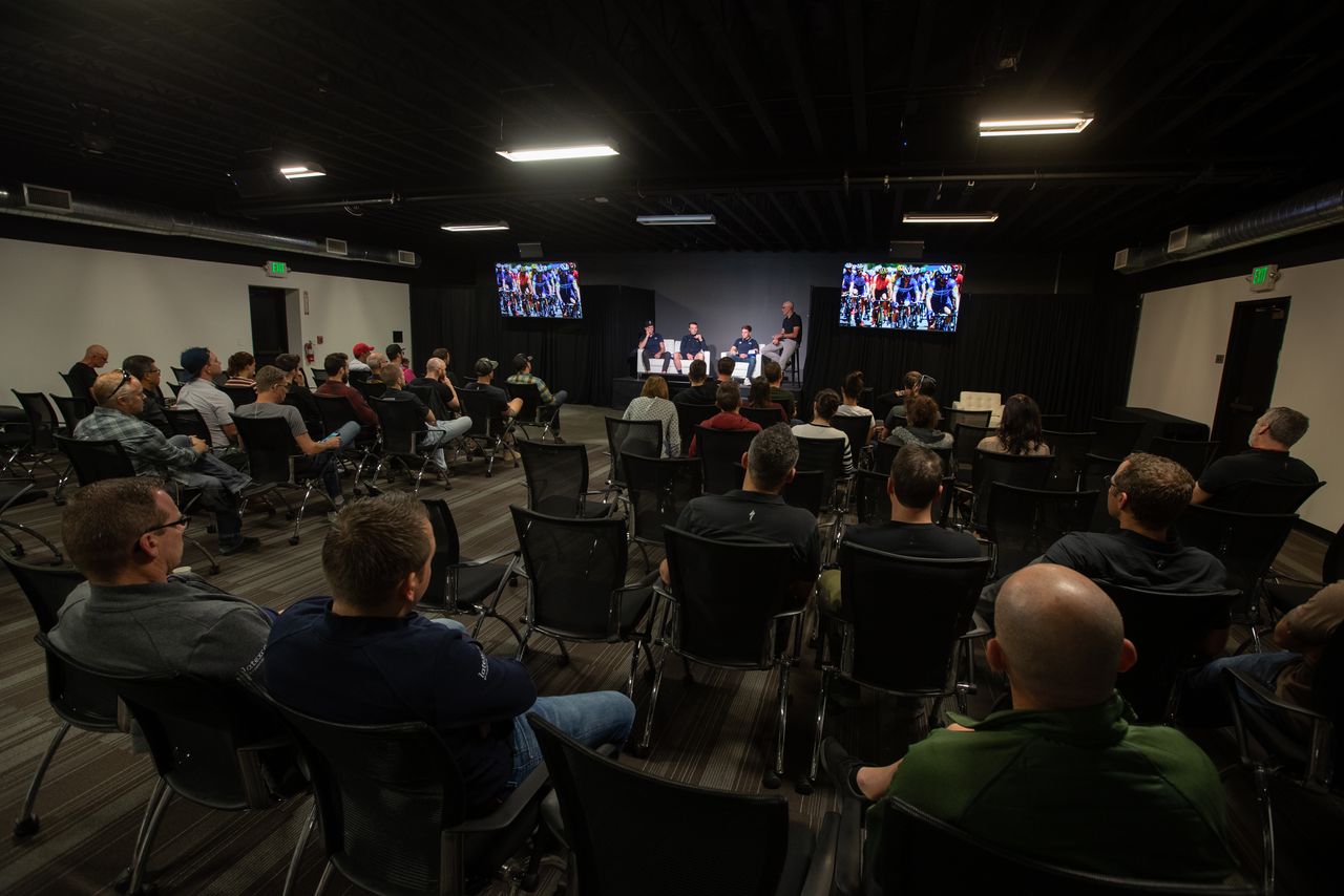 The riders on stage for a talk with Specialized staff