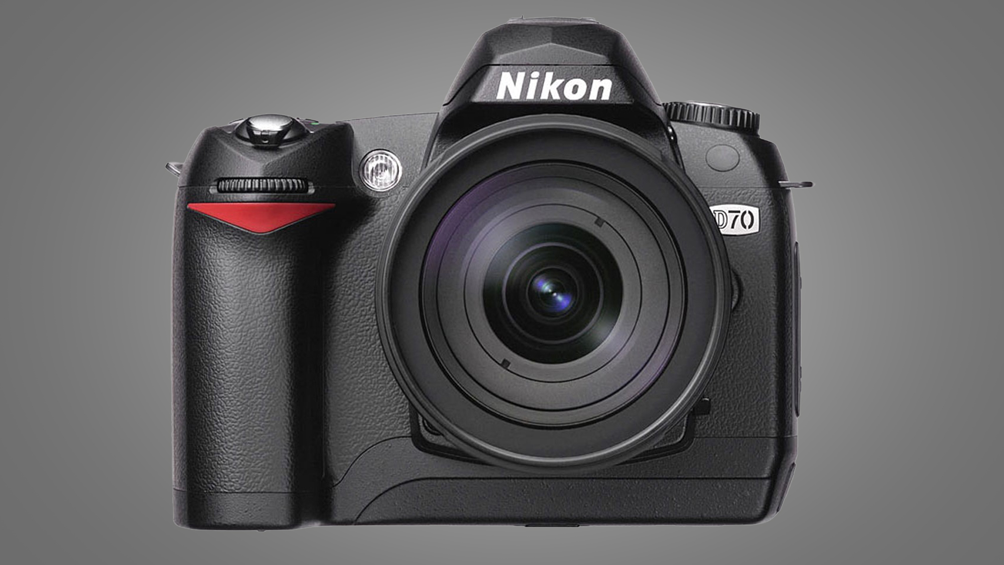 The Nikon D70 camera on a grey background