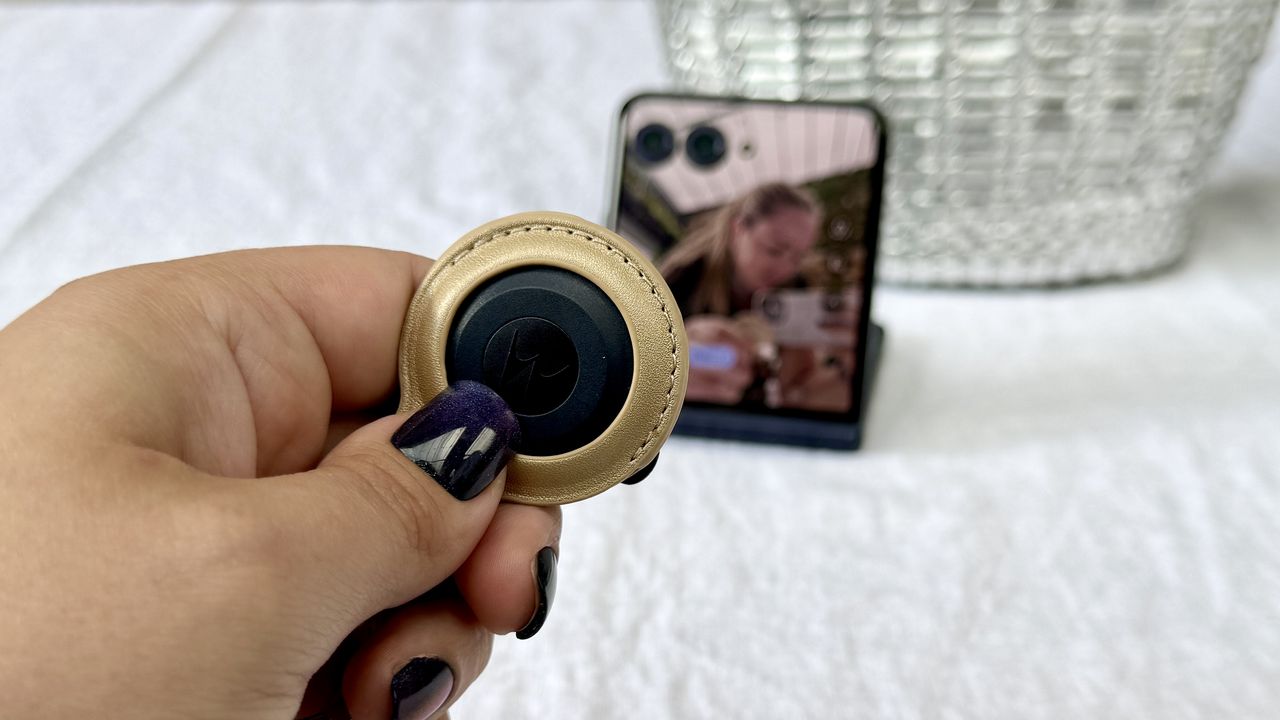 Moto Tag shutter camera