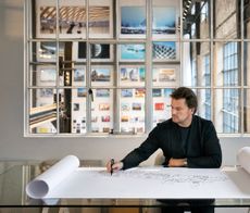 Bjarke Ingels at his Copenhagen office in January 2018, sketching the layout of Noma’s new purpose-built home.