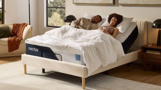 A couple sleep on the Nectar Classic Mattress on an adjustable bed frame so that they can elevate their heads