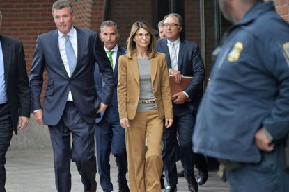 Lori Loughlin exits the John Joseph Moakley U.S. Courthouse after appearing in Federal Court to answer charges stemming from college admissions scandal on April 3, 2019 in Boston, Massachuset