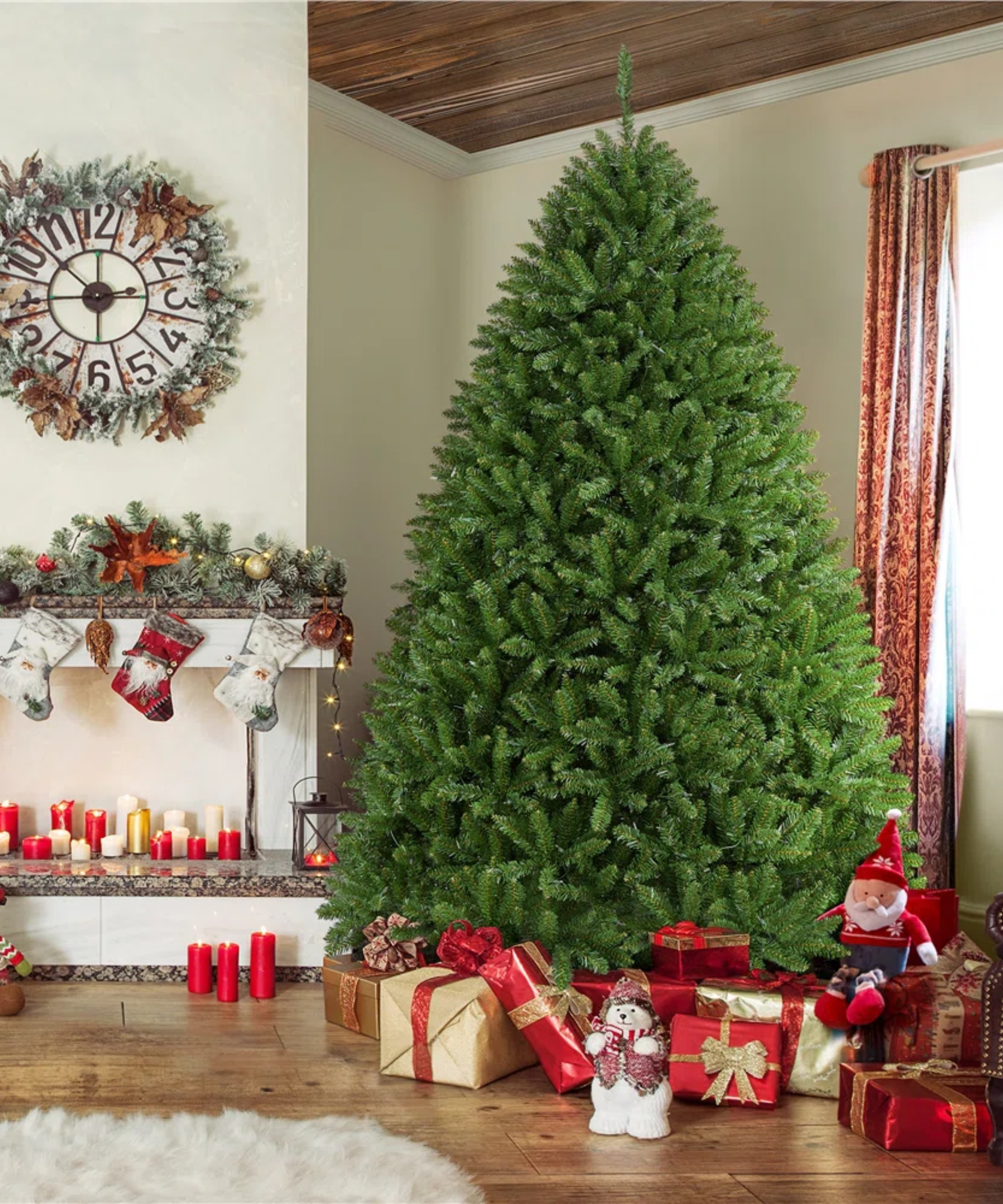 a large christmas tree in a living room with presents underneath
