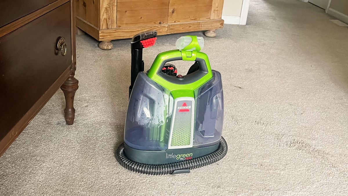 Bissell Little Green ProHeat Portable Carpet Cleaner being tested in writer's home