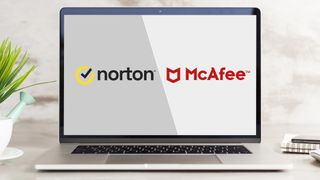 A laptop with the screen displaying both the logos for Norton antivirus and McAfee antivirus softwares. 