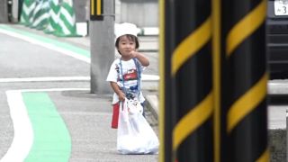 A young boy gives his mom a thumbs up before going on an errand on Old Enough!