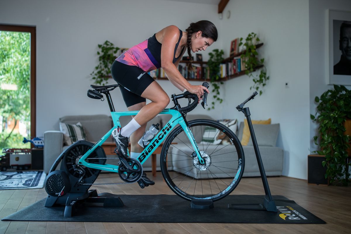 A female riding using an indoor trainer