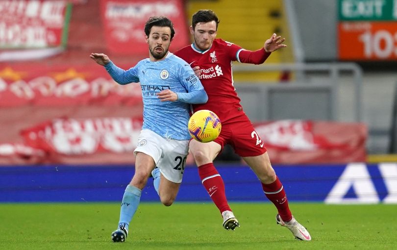 Bernardo Silva and Andy Robertson battle for the ball