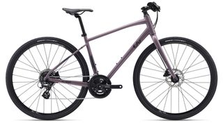 A side profile of the Liv Alight DD Disc 2 hybrid bike in front of a plain background
