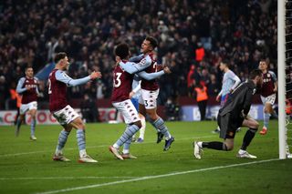 Philippe Coutinho is mobbed after scoring on his debut for Aston Villa