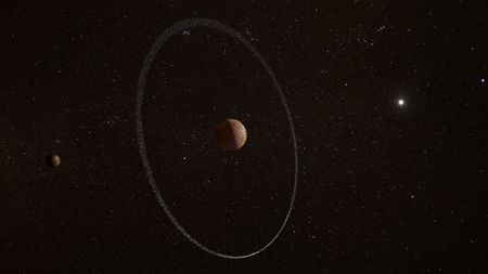 An artist’s impression of the dwarf planet Quaoar and its ring. Quaoar’s moon Weywot is shown on the left. 