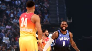 LeBron James #6 of the Los Angeles Lakers celebrates as Giannis Antetokounmpo #34 of the Milwaukee Bucks looks on during the 2023 NBA All Star Game between Team Giannis and Team LeBron at Vivint Arena on February 19, 2023 in Salt Lake City, Utah.