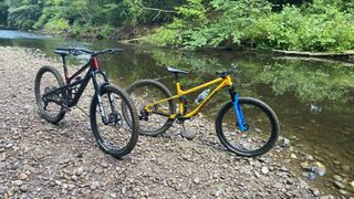 Canyon Spectral 125 and Carbon Wasp by a river