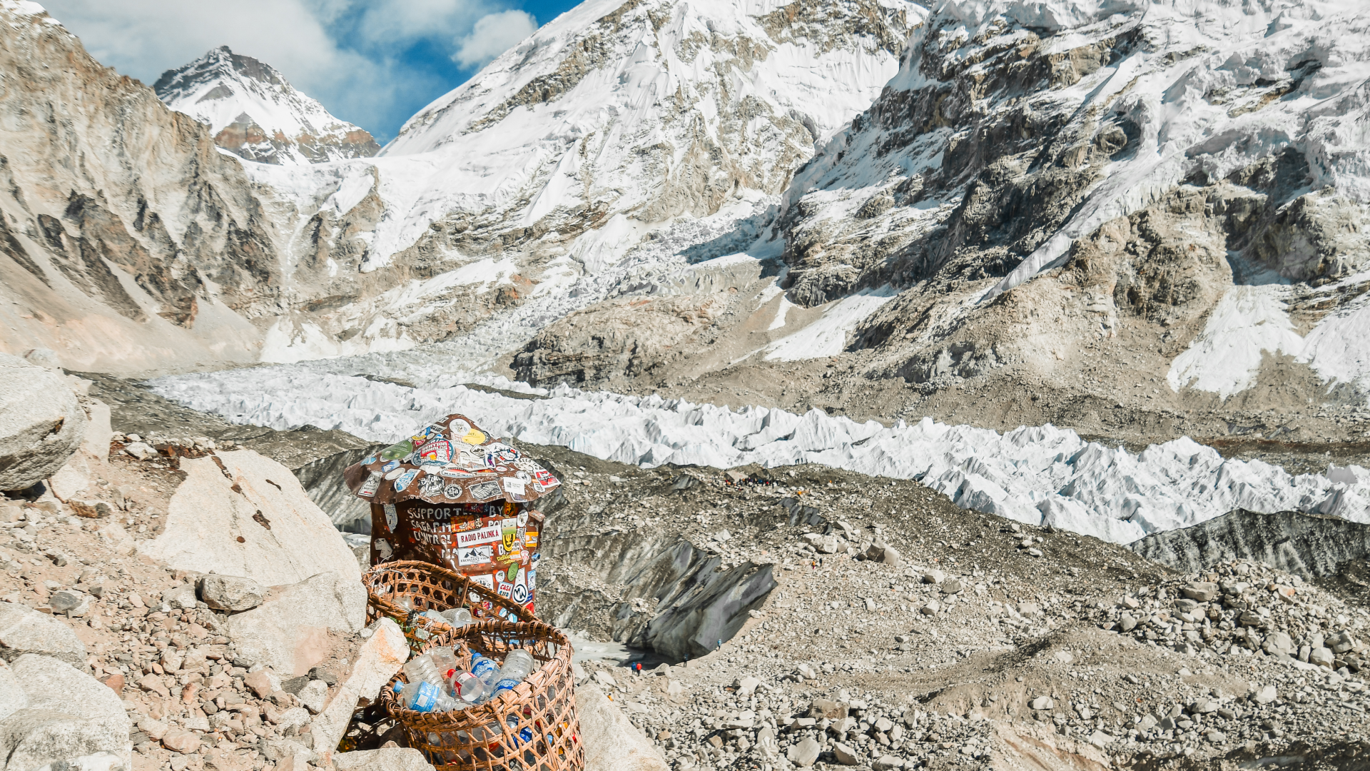 baskets of trash on mount everest