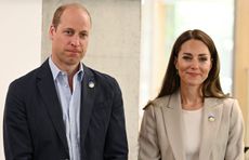 Prince William, Duke of Cambridge and Kate Middleton, Duchess of Cambridge tour the facilities during a visit at the London headquarters of the Disasters Emergency Committee