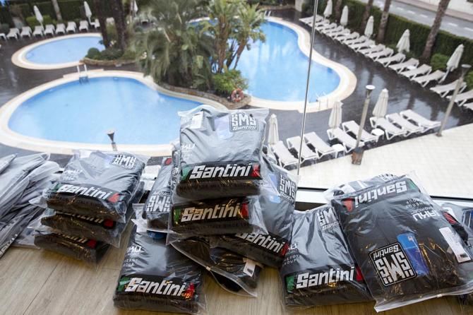 Stacks of t-shirts and polo shirts waiting to be distributed