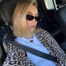 Whitney Port in a leopard sweater and sunglasses
